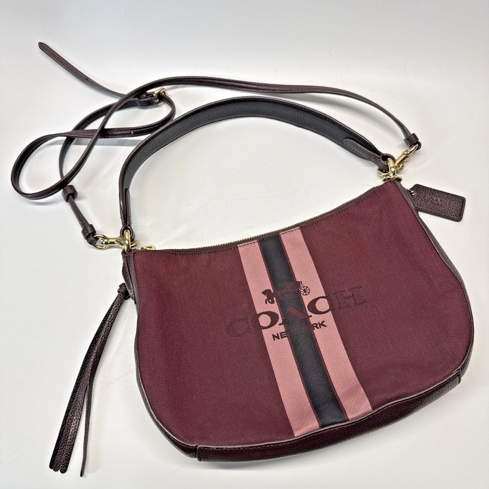Coach Sutton Crossbody Horse and Carriage Jacquard Oxblood Maroon Tassel Pebble